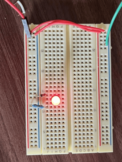 A diode allowing current to flow to an LED